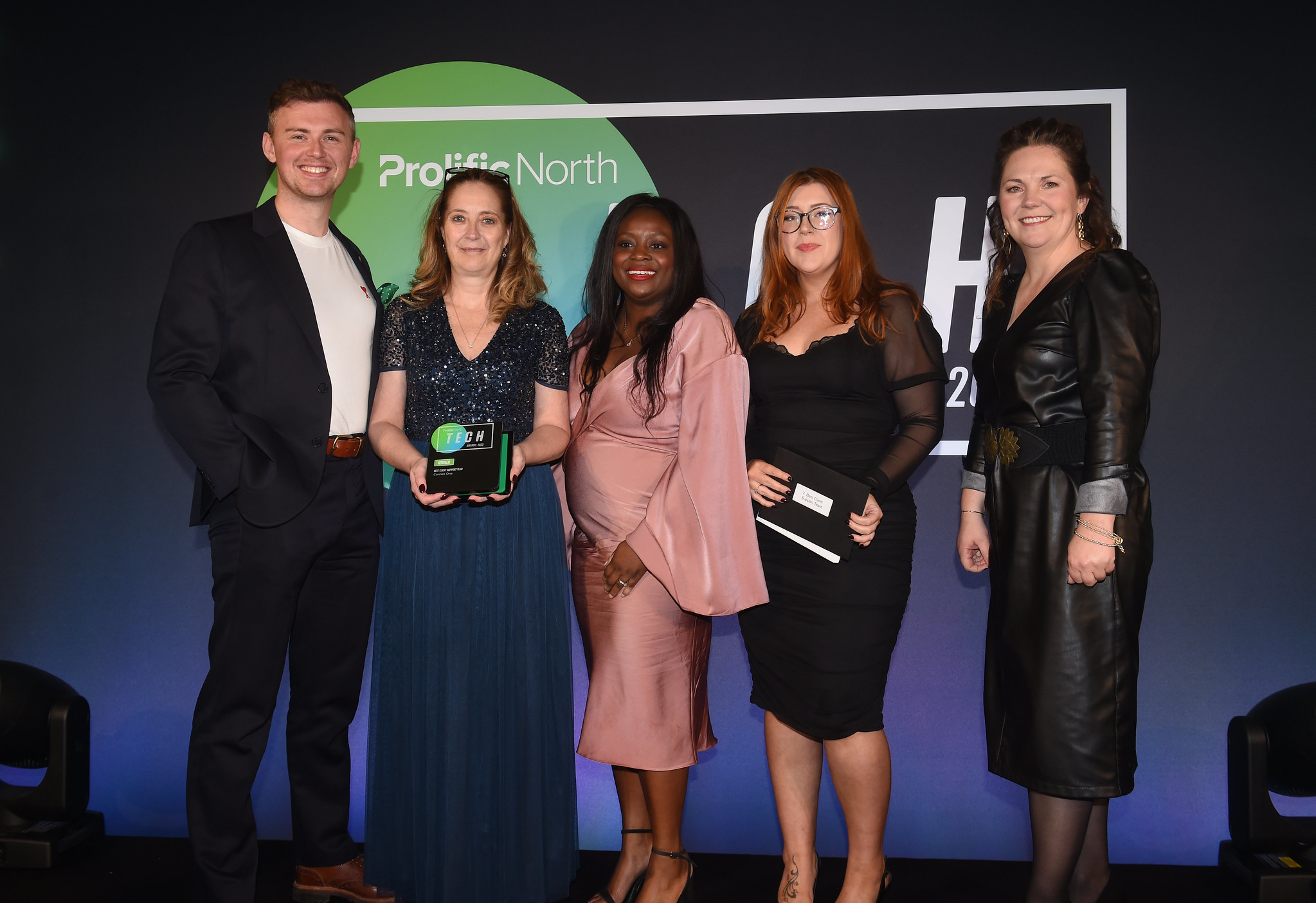 Photograph of the ConnexAI team holding their awards from the Prolific North Tech Awards 2023.